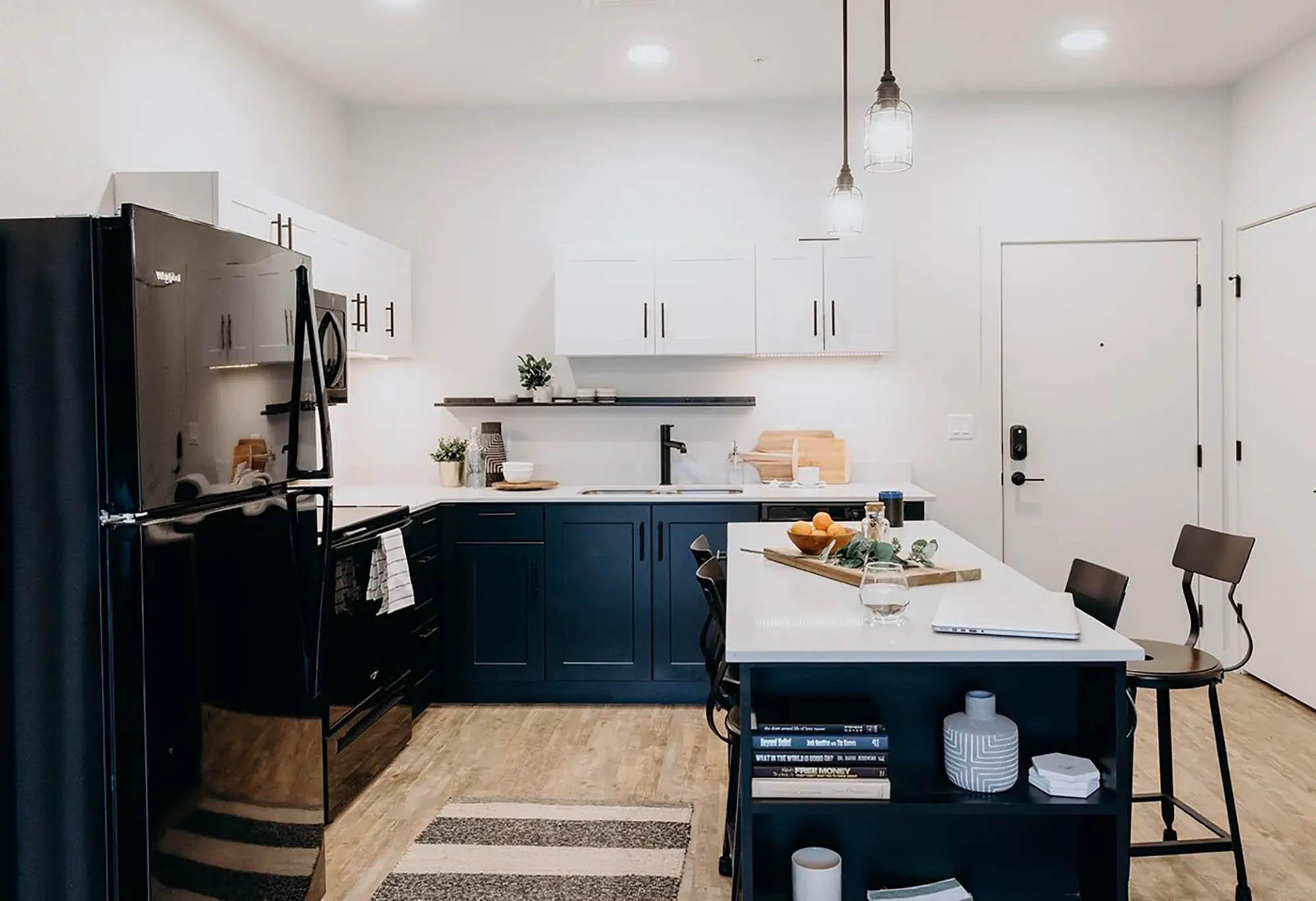 Bright kitchen with dark cabinetry and modern finishes